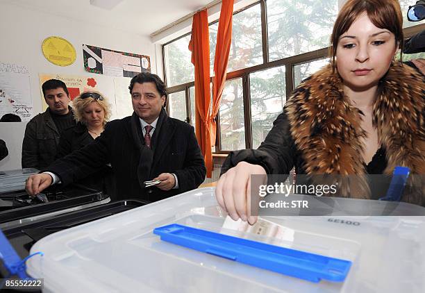 Presidential candidate of the biggest opposition SDSM party Ljubomir Frckovski and his wife Irena cast their ballots at a polling station in Skopje...