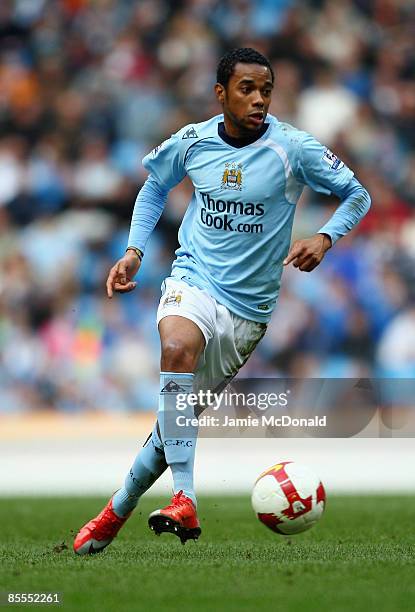 Robinho of Manchester City runs with the ball during the FA Barclays Premier League match between Manchester City and Sunderland at the City of...