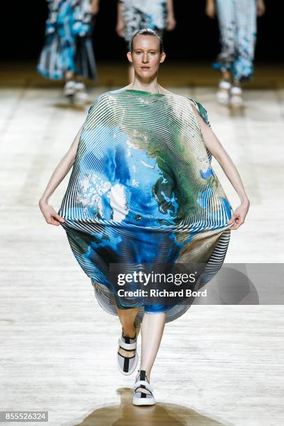 Model walks the runway during the Issey Miyake show at Grand Palais as part of Paris Fashion Week Womenswear Spring/Summer 2018 on September 29, 2017...