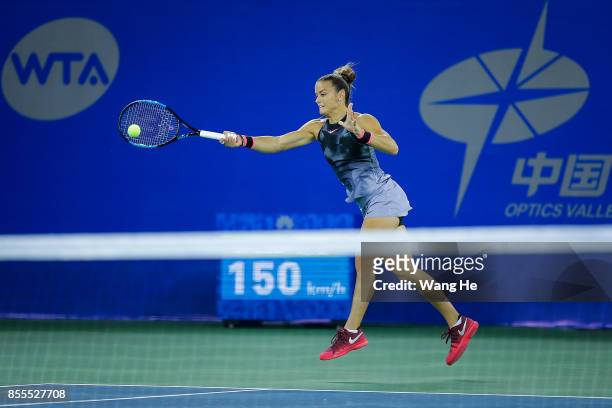 Maria Sakkari of Greece returns a shot during the match against Caroline Garcia of France on Day 6 of 2017 Dongfeng Motor Wuhan Open at Optics Valley...