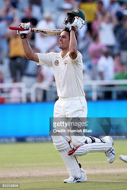 Mitchell Johnson of Australia celebrates his century during day four of the Third Test between South Africa and Australia played at Newlands on March...