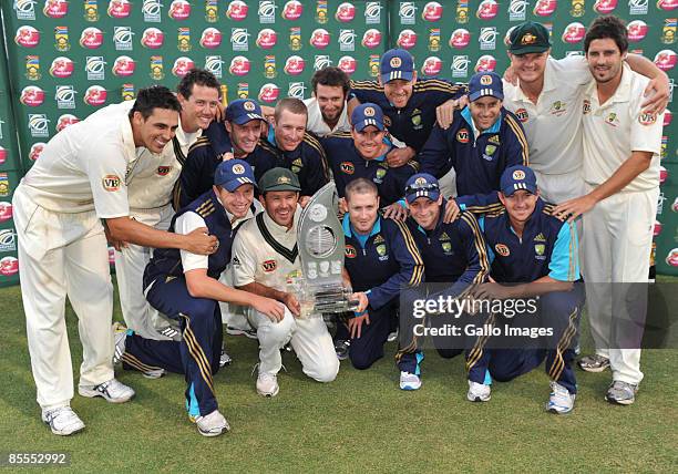 The Australian team celebrate with the trophy after winning the three-Test series during day four of the Third Test between South Africa and...