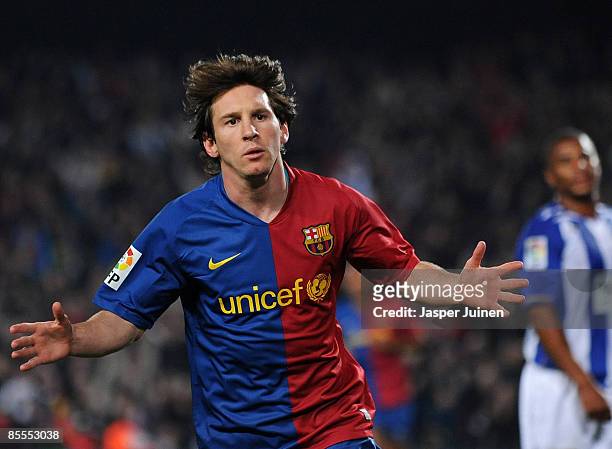 Lionel Messi of Barcelona celebrates scoring during the La Liga match between Barcelona and Malaga at the Camp Nou Stadium on March 22, 2009 in...