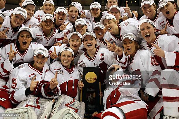 The Wisconsin Badgers pose with the championship trohpy after they defeated the Mercyhurst Lakers on March 22, 2009 during the NCAA Women's Frozen...