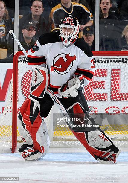 Martin Brodeur of the New Jersey Devils stops the puck during the game against the Boston Bruins at the TD Banknorth Garden on March 22, 2009 in...