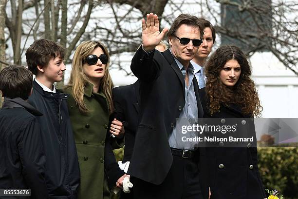 Actor Liam Neeson with family son Daniel Neeson, son Micheal Neeson, an unidentified person, and niece Daisy Bevan arrive for the funeral of actress...