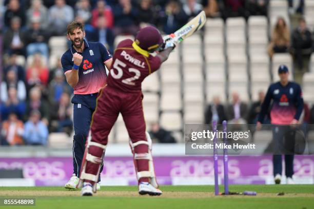 Liam Plunkett of England celebrates after bowling Rovman Powell of West Indies during the 5th Royal London One Day International between England and...