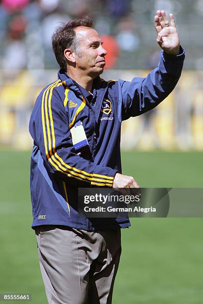 Head Coach Bruce Arena of the Los Angeles Galaxy celebrates after the final whistle is blown after the game between the Los Angeles Galaxy and DC...