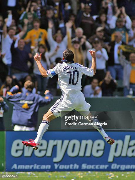 Forward Landon Donovan of the Los Angeles Galaxy celebrates after scoring his second goal of the season against DC United during their MLS game at...