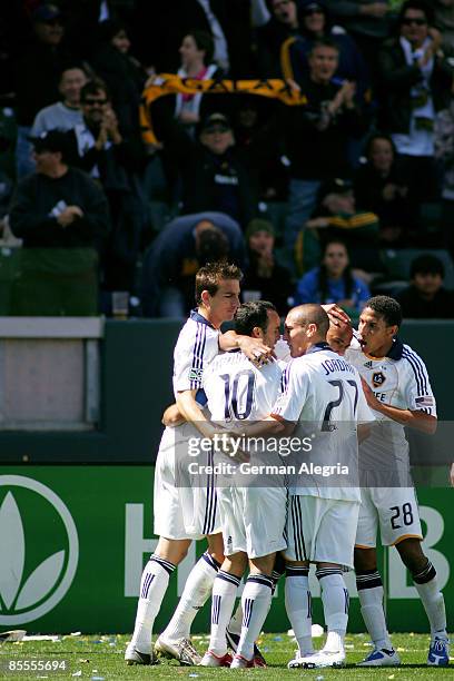 Forward Landon Donovan of the Los Angeles Galaxy celebrates after scoring his second goal of the season against DC United during their MLS game at...