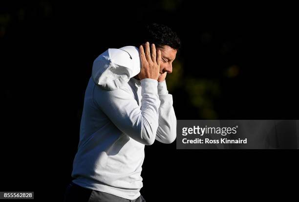 Rory McIlroy of Northern Ireland prepares to reacts after his second shot on the 16th hole during day two of the British Masters at Close House Golf...