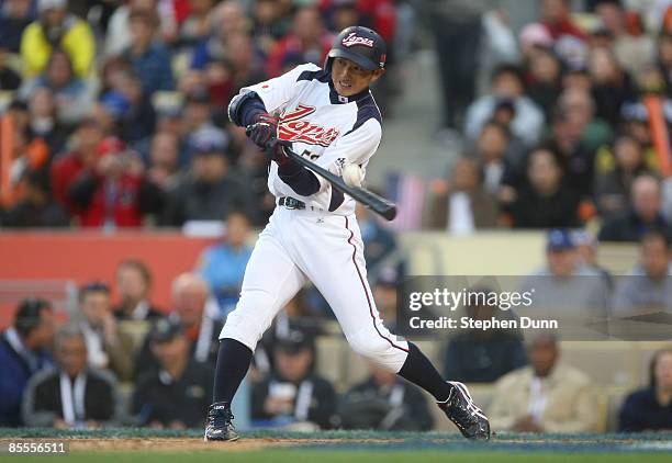 Munenori Kawasaki of Japan hits an RBI single to score the fourth run of the fourth inning of the semifinal game of the 2009 World Baseball Classic...