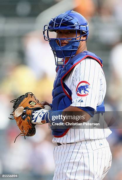 Welington Castillo of the Chicago Cubs in action during the spring training game against the Oakland Athletics at HoHoKam Park on March 3, 2009 in...
