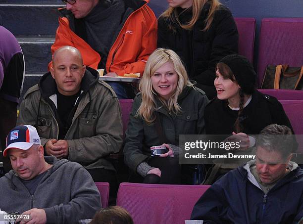 Kirsten Dunst and guests attend the Ottawa Senators versus New York Rangers game at Madison Square Garden on March 22, 2009 in New York City.