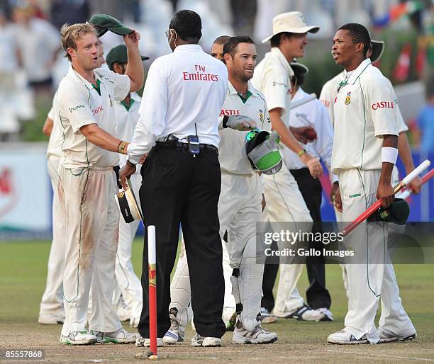 De Villiers says goodbye to Steve Bucknor during day 4 of the 3rd test match between South Africa and Australia from Sahara Park Newlands on March...