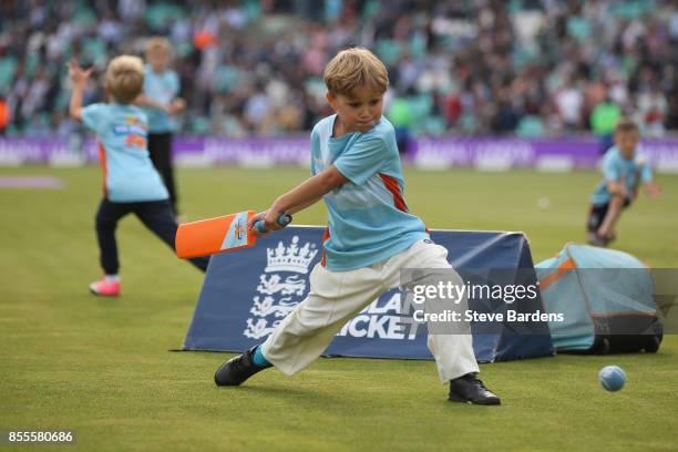 Children participate in an All Stars Cricket session during the interval at the 4th Royal London One Day International between England and West...