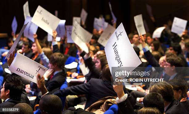 Students vote in one of many committees on the first day of the Harvard World Model United Nations at the World Forum in The Hague on March 23. More...