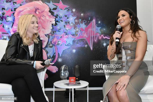 Demi Lovato answered questions during the DEMI x JBL Tell Me You Love Me Pop Up event, celebrating her new album and partnership with JBL. The album...