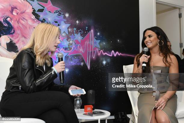 Demi Lovato answered questions during the DEMI x JBL Tell Me You Love Me Pop Up event, celebrating her new album and partnership with JBL. The album...