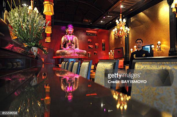 Lifestyle-Indonesia-Buddhism-religion-France,FEATURE by Stephen Coates This picture taken on March 19, 2009 shows a giant Buddha statue on the second...