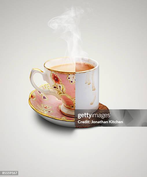 rich and poor man tea cups  - poverty stockfoto's en -beelden