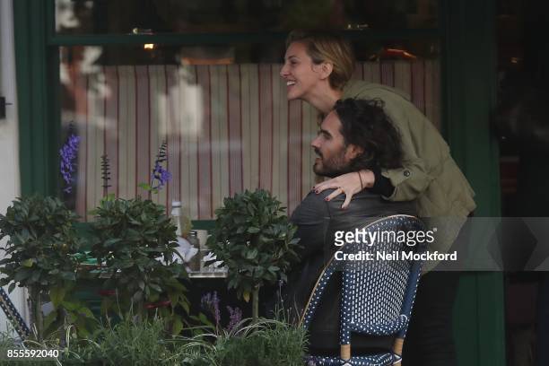 Russell Brand and Laura Gallacher are seen at breakfast at Sam's Cafe in Primrose Hill on September 29, 2017 in London, England.