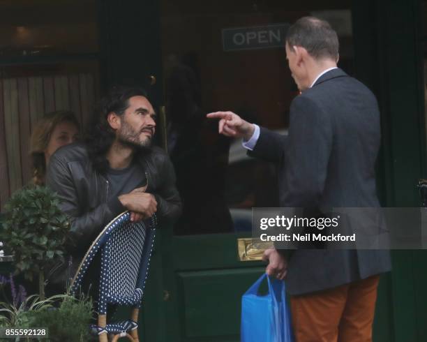 Russell Brand and Laura Gallacher are seen at breakfast at Sam's Cafe in Primrose Hill on September 29, 2017 in London, England.