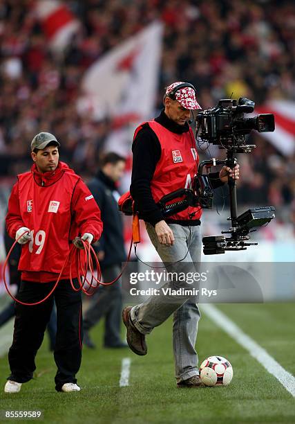 Steadicam cameraman is seen prior to the Bundesliga match between VfB Stuttgart and Hertha BSC Berlin at the Mercedes-Benz Arena on March 21, 2009 in...