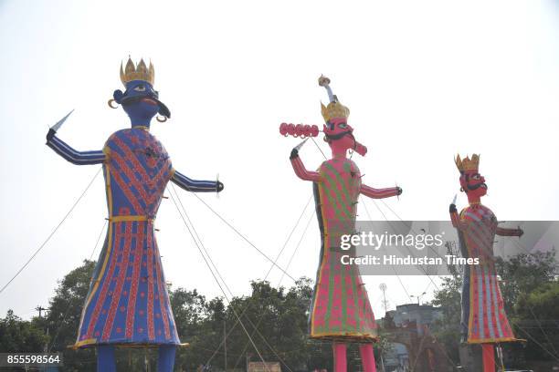 The effigies of Ravana, Kumbhakaran and Meghnad before they will be set afire on the festival of Dusshehra at Ghanta Ghar Ramlila Ground on September...