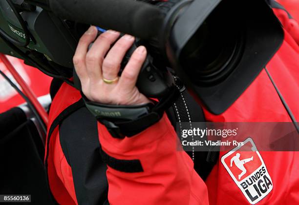 Detail view of a Bundesliga logo is seen on a bib of a TV cameraman during the second Bundesliga match between Greuther Fuerth and 1860 Muenchen at...