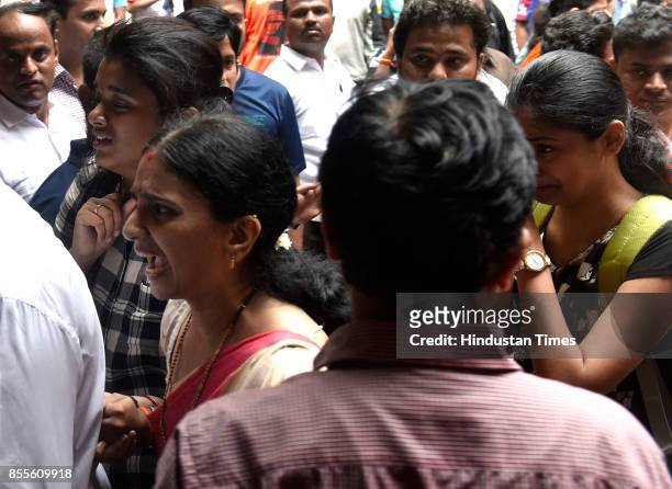 Relatives of injured in stampede outside Kem Hospital on September 29, 2017 in Mumbai, India. Twenty-two people including a child were killed and...