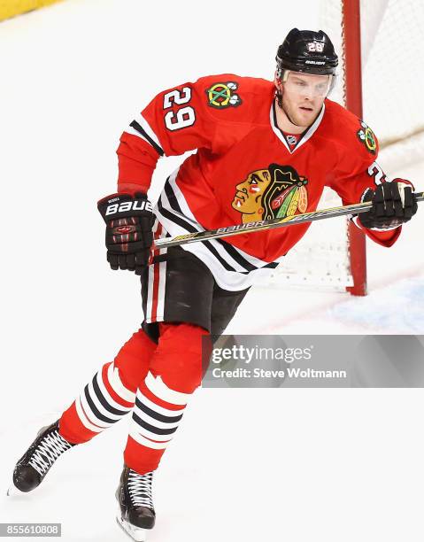 Bryan Bickell of the Chicago Blackhawks plays in a game against the Winnipeg Jets at the United Center on December 23, 2014 in Chicago, Illinois.