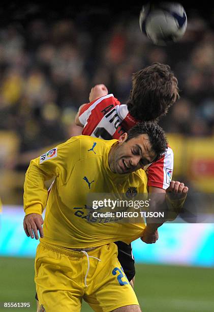 Villarreal's Italian Giuseppe Rossi fights for the ball with Athletic Bilbao''s Aitor Ocio during their Spanish league football match at the Madrigal...