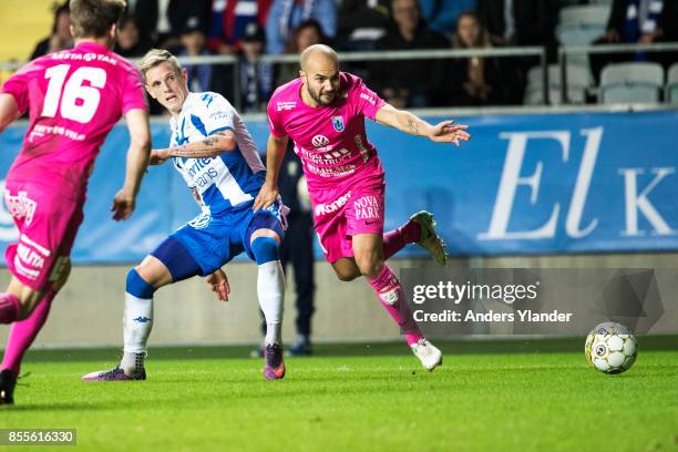 Soren Rieks of IFK Goteborg fight for the ball with Karl Larson of IK Sirius FK during the Allsvenskan match between IFK Goteborg and IK Sirius FK at...