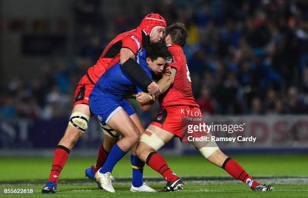 Dublin , Ireland - 29 September 2017; Joey Carbery of Leinster is tackled by Grant Gilchrist, left, and Darryl Marfo of Edinburgh during the Guinness...