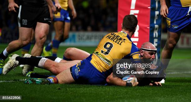 Gareth Ellis of Hull FC celebrates scoring his team's first try during the Betfred Super League semi final between Leeds Rhinos and Hull FC at...