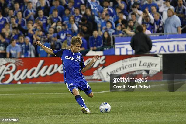 Aaron Hohlbein of the Kansas City Wizards clears the ball against Toronto FC during the game at Community America Ballpark on March 21, 2009 in...