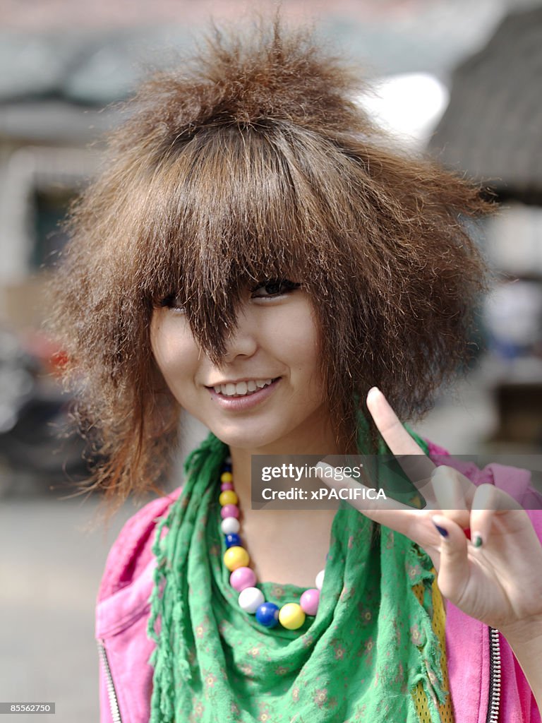 A Chinese Girl With A Unique Haircut High-Res Stock Photo - Getty Images