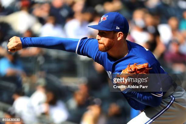 Danny Barnes of the Toronto Blue Jays pitches during the sixth inning against the New York Yankees at Yankee Stadium on September 29, 2017 in the...