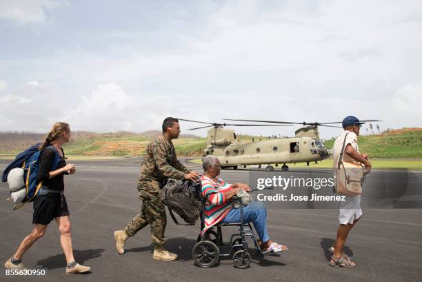Marines evacuate residents in Dominica as part of the Joint Task Force Leeward Islands missions on September 27, 2017. Hurricane Maria inflicted...