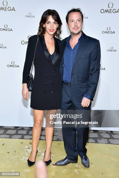 Noemie Elbaz and Davy Sardoux attend "Her Time" Omega Photocall as part of the Paris Fashion Week Womenswear Spring/Summer 2018 on September 29, 2017...