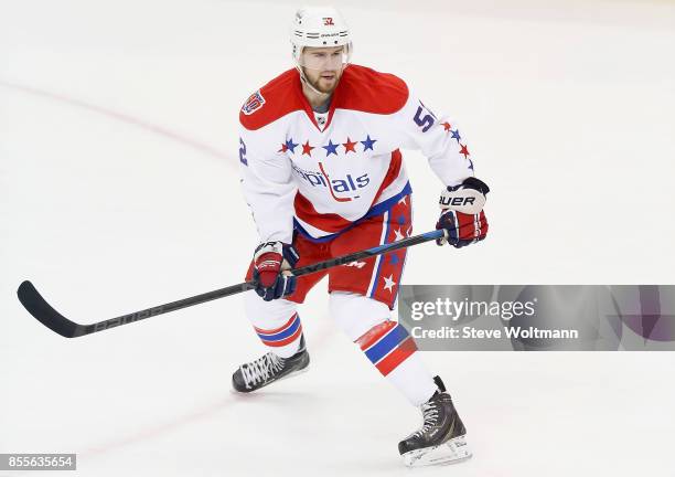 Mike Green of the Washington Capitals plays in a game against the Pittsburgh Penguins at the Consol Energy Center on December 27, 2014 in Pittsburgh,...