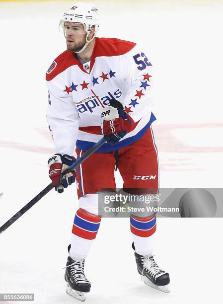 Mike Green of the Washington Capitals plays in a game against the Pittsburgh Penguins at the Consol Energy Center on December 27, 2014 in Pittsburgh,...