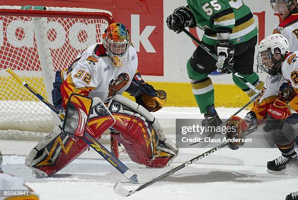 Jaroslav Janus of the Erie Otters keeps an eye on the puck in game one of the opening round of the 2009 play-offs against the London Knights on March...