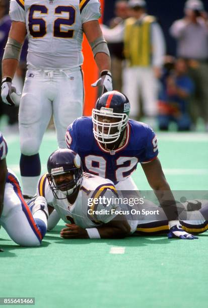 Michael Strahan of the New York Giants in action against the Minnesota Vikings during an NFL football game September 29, 1996 at Giants Stadium in...