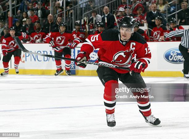 Jamie Langenbrunner of the New Jersey Devils skates against the Minnesota Wild at the Prudential Center on March 20, 2009 in Newark, New Jersey. The...