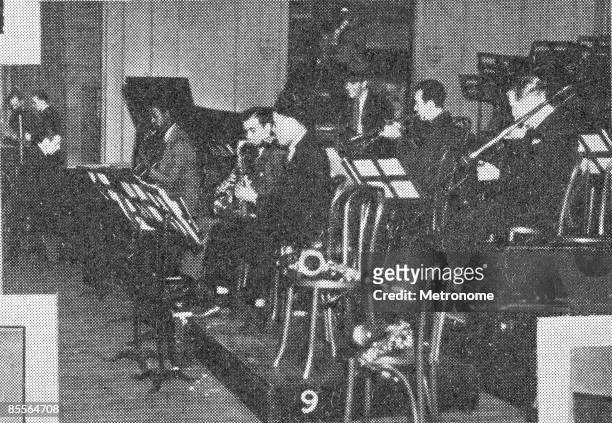 American band leader Benny Goodman and his band rehearse for their debut perfomance at Carnegie Hall, New York, New York, January 16, 1938. Among...
