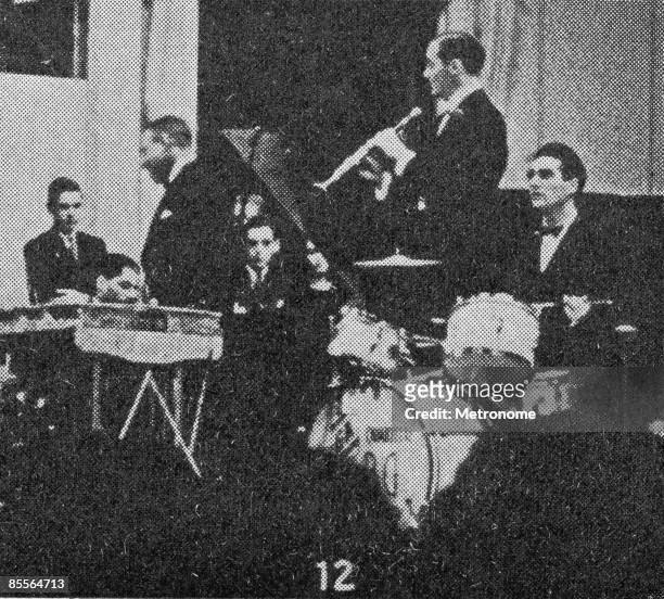 American band leader Benny Goodman and his band perform in their debut perfomance at Carnegie Hall, New York, New York, January 16, 1938. Among the...