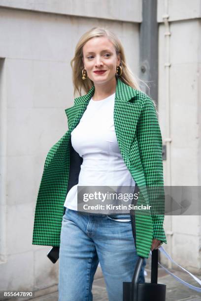Fashion stylist Kate Foley Osterweis wears a Breelayne jacket on day 2 of London Womens Fashion Week Spring/Summer 2018, on September 16, 2017 in...