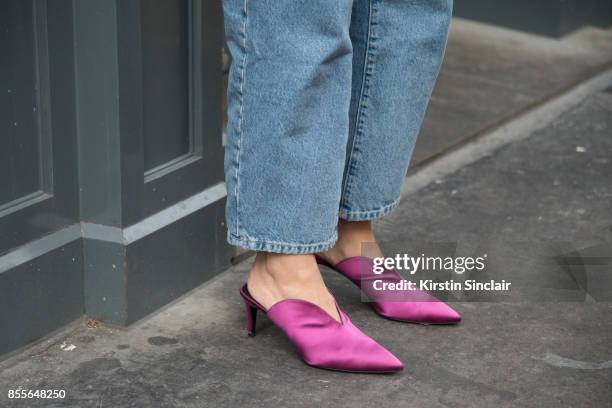 Fashion journalist and co founder of www.and-finally.co.uk Anna Rosa Vitiello wears Current Elliot jeans and Aeyde shoes on day 2 of London Womens...